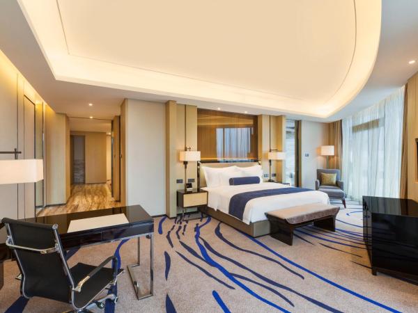 Wyndham Chongqing Yuelai : photo 5 de la chambre suite lit king-size