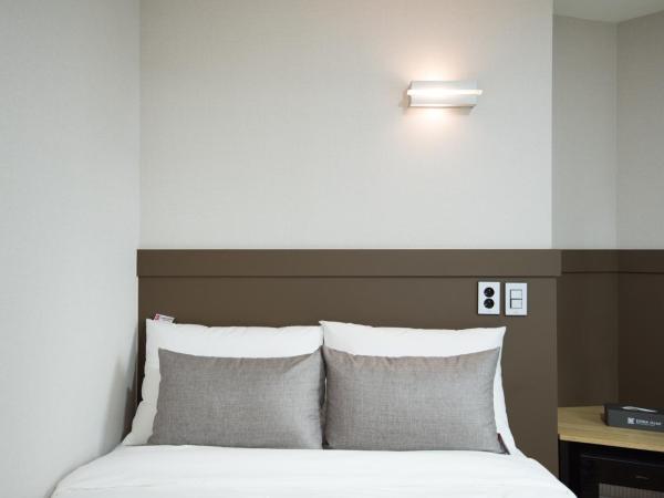 Ehwa In Myeongdong : photo 7 de la chambre chambre triple standard