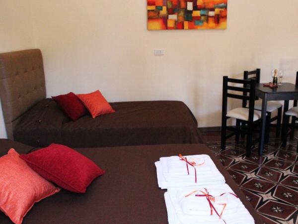 Villa Cabrera Apart and Suites : photo 3 de la chambre chambre triple Économique