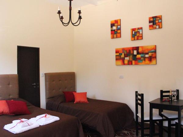 Villa Cabrera Apart and Suites : photo 8 de la chambre chambre triple Économique