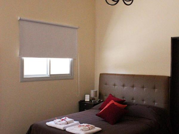 Villa Cabrera Apart and Suites : photo 6 de la chambre chambre triple Économique