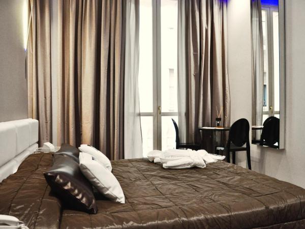 Le Camp Suite & Spa : photo 9 de la chambre chambre simple avec lit king-size et balcon