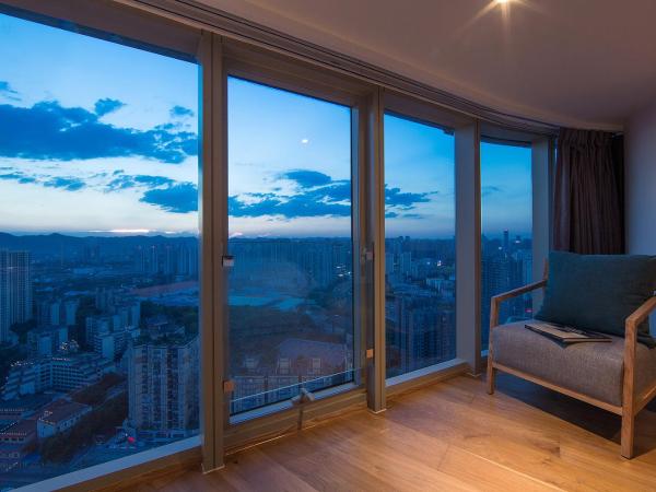 Bai Yun Qin She Boutique : photo 5 de la chambre chambre lits jumeaux deluxe - vue sur ville