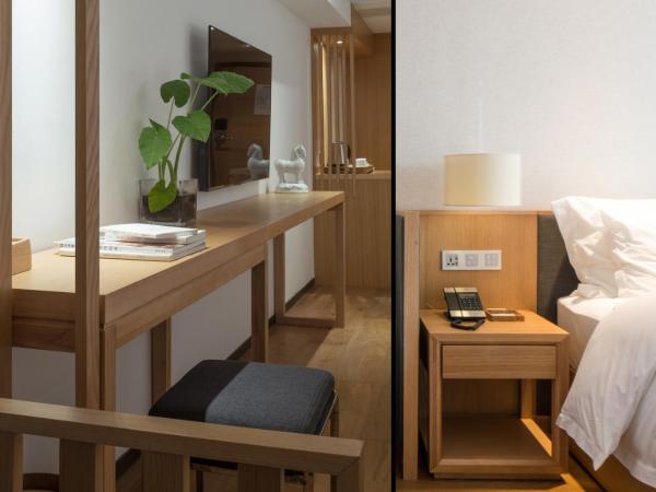 Bai Yun Qin She Boutique : photo 5 de la chambre chambre lits jumeaux deluxe - vue sur ville