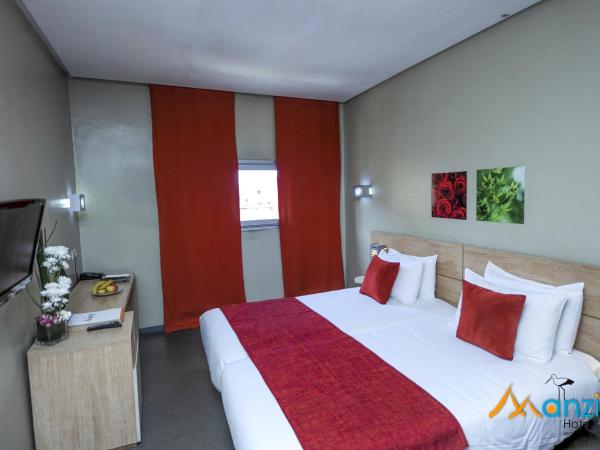 Manzil Hotel : photo 4 de la chambre chambre lits jumeaux