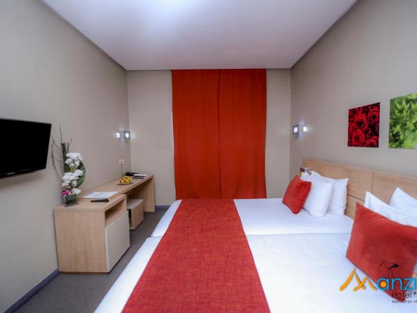 Manzil Hotel : photo 5 de la chambre chambre lits jumeaux