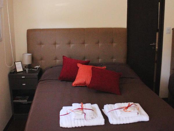 Villa Cabrera Apart and Suites : photo 1 de la chambre chambre triple Économique