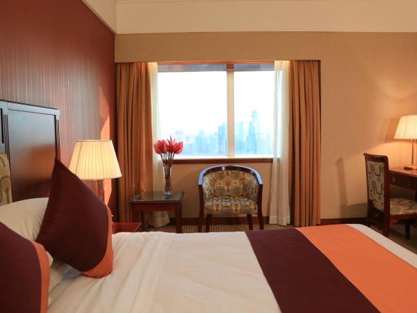 Asia International Hotel Guangdong : photo 3 de la chambre chambre double deluxe