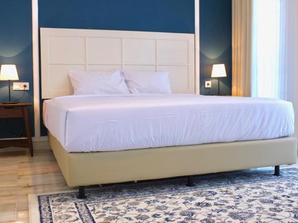 Rumah Kertajaya : photo 6 de la chambre suite lit king-size