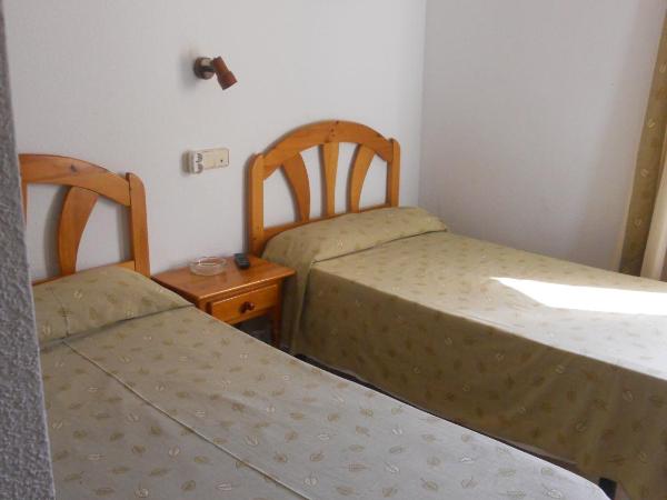 Hostal El Descanso : photo 4 de la chambre chambre lits jumeaux
