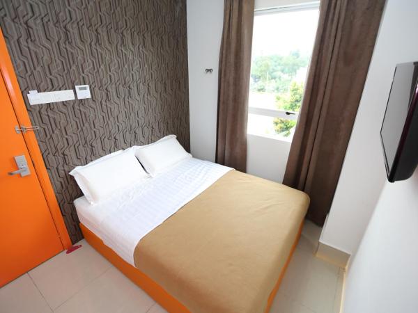 1 Hotel Taman Connaught : photo 9 de la chambre chambre deluxe