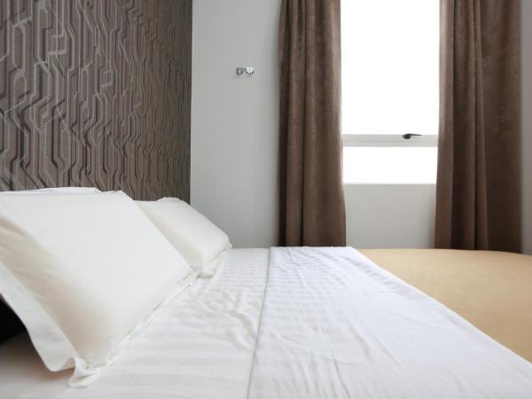 1 Hotel Taman Connaught : photo 5 de la chambre chambre deluxe