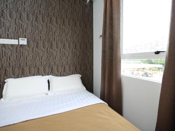 1 Hotel Taman Connaught : photo 3 de la chambre chambre deluxe