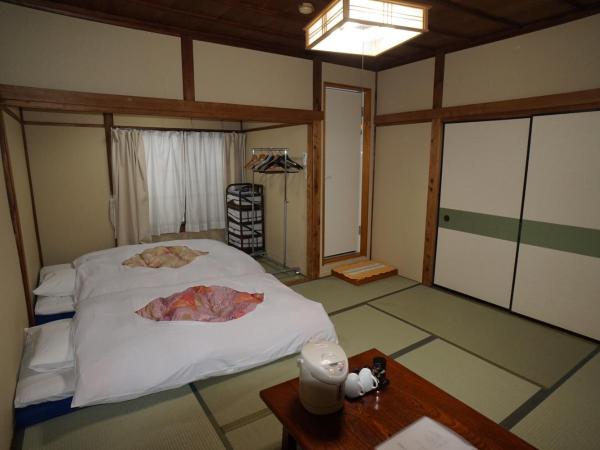 Ryokan Katsutaro : photo 1 de la chambre chambre deluxe double ou lits jumeaux