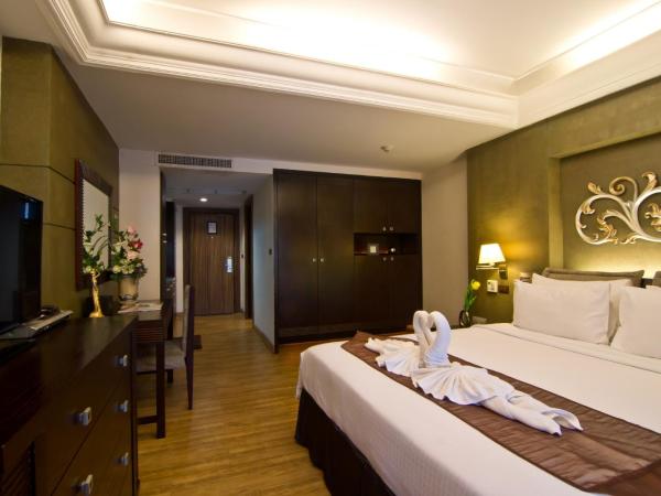 LK Mantra Pura Resort : photo 4 de la chambre chambre deluxe double ou lits jumeaux
