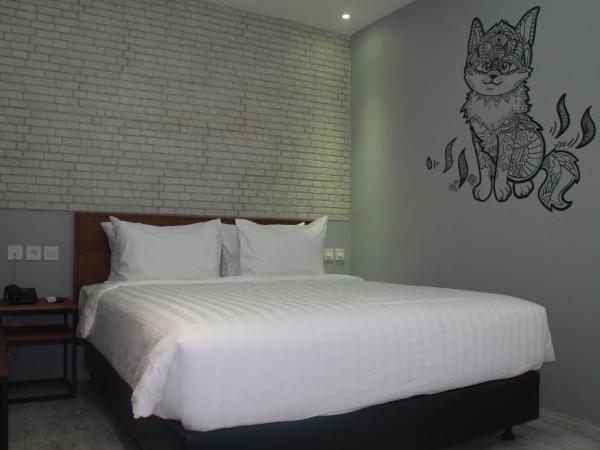 Nite & Day Surabaya - Kedungdoro : photo 8 de la chambre chambre double ou lits jumeaux supérieure