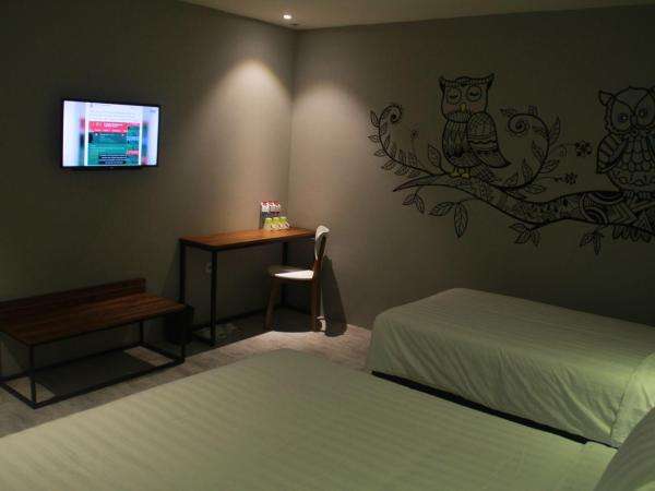 Nite & Day Surabaya - Kedungdoro : photo 3 de la chambre chambre familiale deluxe