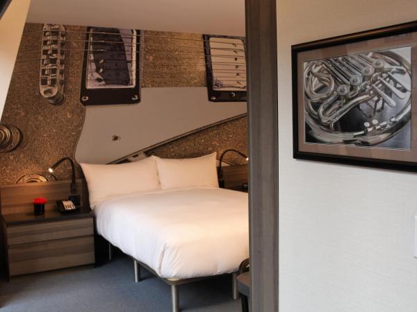 Carnegie Hotel : photo 4 de la chambre suite junior supérieure avec lit queen-size