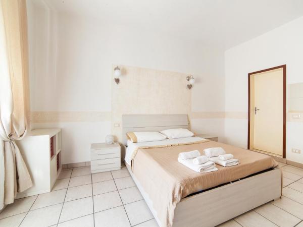 Affittacamere San Jacopino : photo 1 de la chambre chambre triple