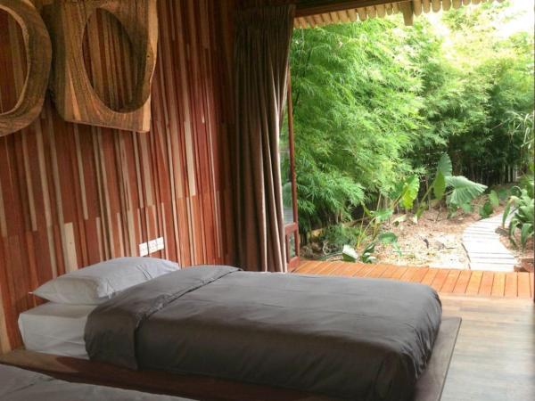 The Happy 8 Retreat : photo 4 de la chambre chambre lits jumeaux supérieure - vue sur jardin