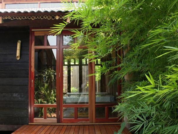 The Happy 8 Retreat : photo 5 de la chambre chambre lits jumeaux supérieure - vue sur jardin