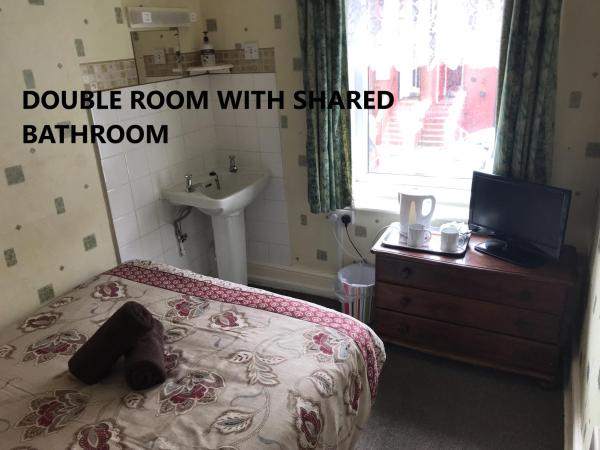 Coco Beach Hotel : photo 6 de la chambre chambre double avec salle de bains commune