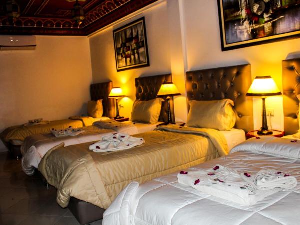 Riad Challa Hotel & Spa : photo 1 de la chambre chambre quadruple