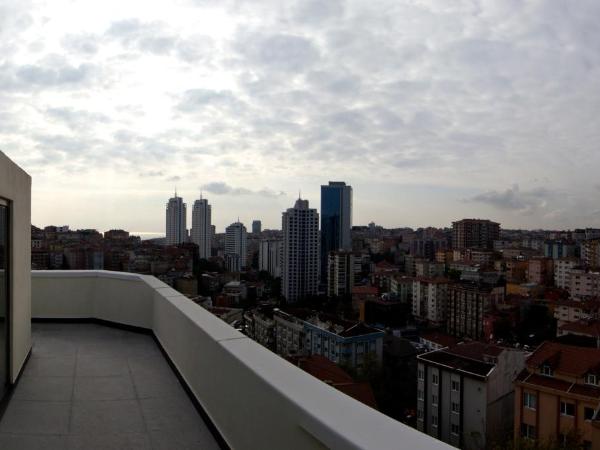 Taba Luxury Suites and Hotel : photo 1 de la chambre suite lit king-size avec baignoire spa