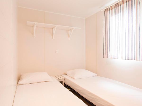 Village Vacances Le Parc Des Chênes (by Popinns) : photo 4 de la chambre mobile home - 8 personnes