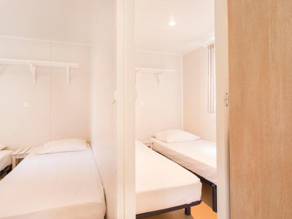 Village Vacances Le Parc Des Chênes (by Popinns) : photo 5 de la chambre mobile home - 8 personnes