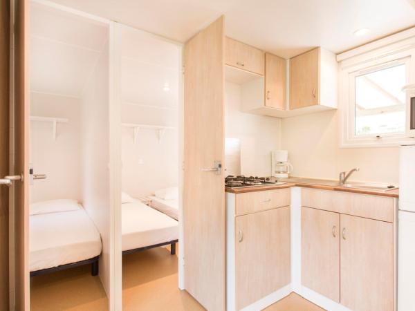 Village Vacances Le Parc Des Chênes (by Popinns) : photo 6 de la chambre mobile home - 8 personnes