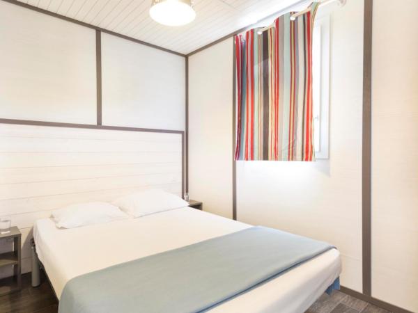 Village Vacances Le Parc Des Chênes (by Popinns) : photo 4 de la chambre chalet 3 chambres (6 personnes)