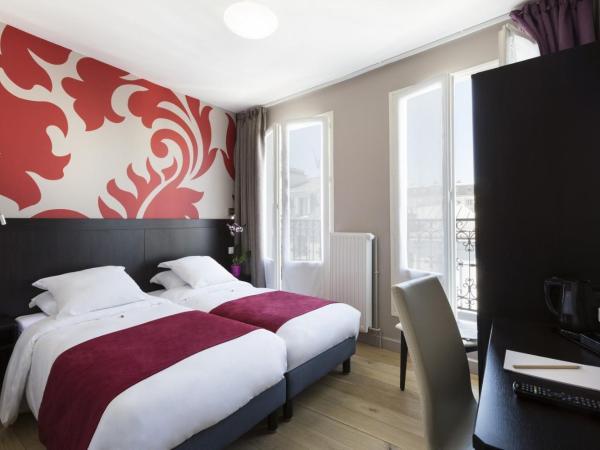 Hotel Bastille : photo 2 de la chambre chambre lits jumeaux - vue sur ville