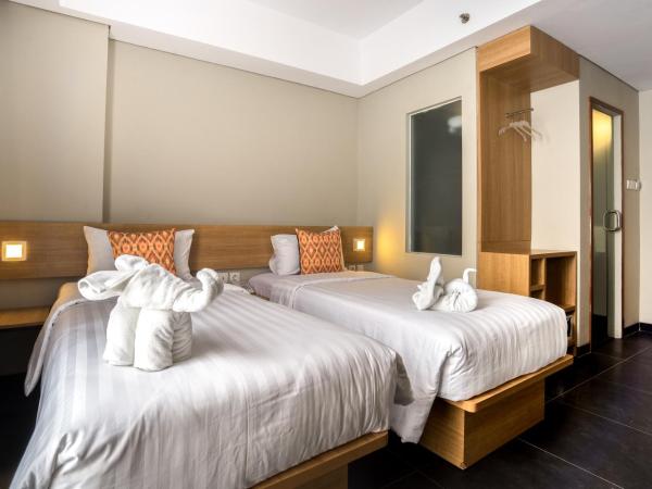 Maple Hotel Grogol : photo 9 de la chambre chambre deluxe double ou lits jumeaux
