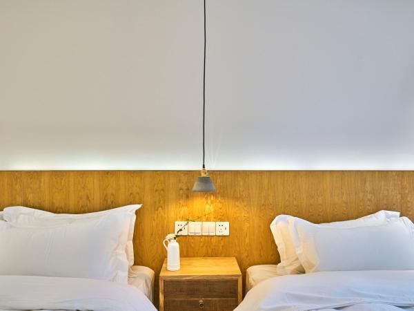 Wei Wen Inn : photo 7 de la chambre chambre triple avec balcon