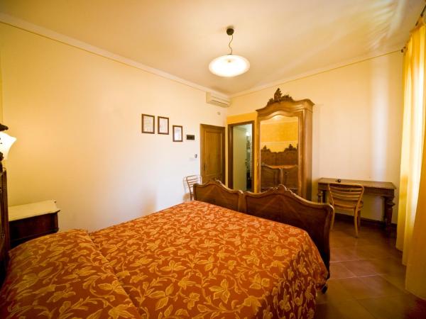 Hotel Merlini : photo 4 de la chambre chambre lit queen-size 