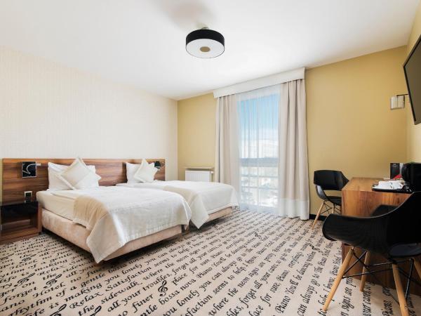 Hotel Piano : photo 1 de la chambre chambre lits jumeaux