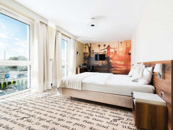 Hotel Piano : photo 1 de la chambre chambre lit king-size