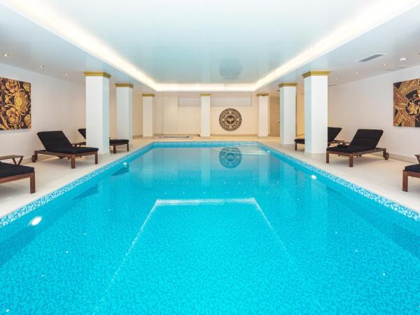 Theoxenia Palace : photo 1 de la chambre chambre avec accès à la piscine intérieure et au spa