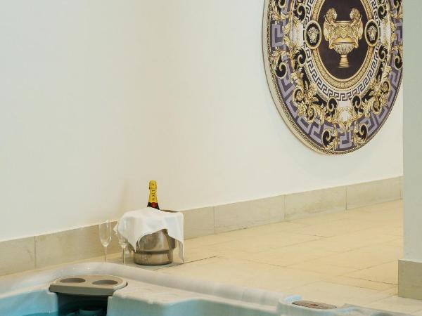 Theoxenia Palace : photo 3 de la chambre chambre avec accès à la piscine intérieure et au spa