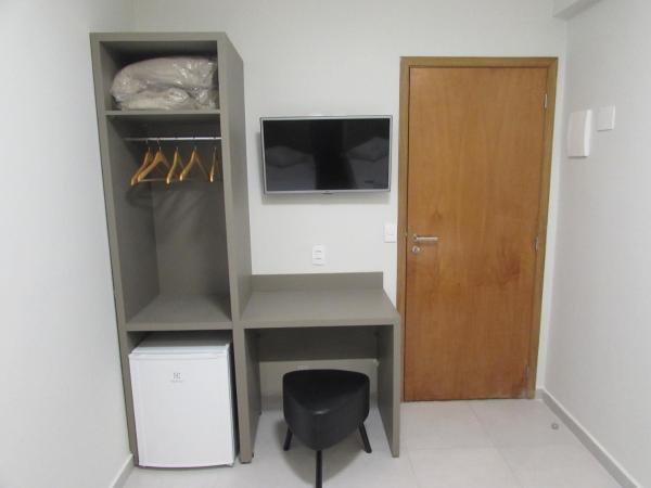 Hotel Urbis a 10 minutos Rua 25 de Março, Brás,Bom Retiro,a 2 minutos do Mirante Sampa Sky e pista de Skate Anhangabaú : photo 2 de la chambre chambre triple Économique