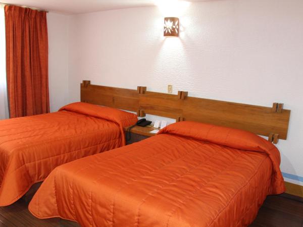 Howard Johnson by Wyndham Morelia Calle Real : photo 2 de la chambre chambre double avec 2 lits doubles - non-fumeurs