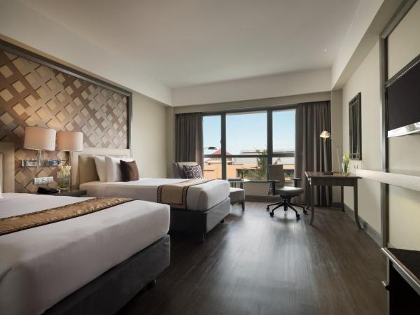 Melia Purosani Yogyakarta : photo 1 de la chambre chambre deluxe double ou lits jumeaux