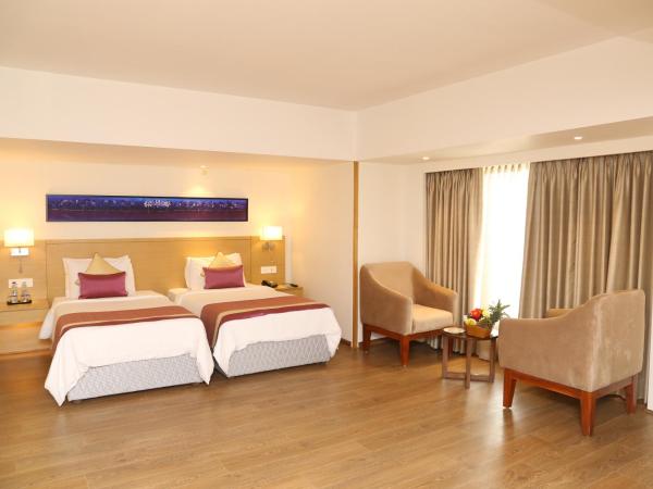 Sarovar Portico Rivera Ahmedabad : photo 2 de la chambre deluxe double or twin room (15% discount on food and soft beverage)