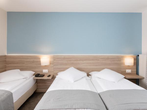 Hôtel de Chailly : photo 1 de la chambre chambre triple classique