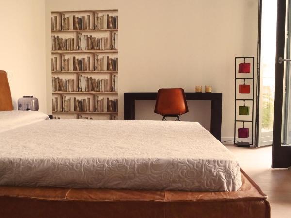 IndispArte Suites : photo 4 de la chambre chambre deluxe