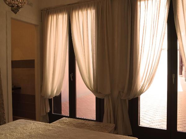 IndispArte Suites : photo 4 de la chambre chambre deluxe