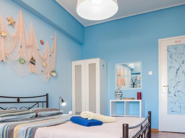 Petaluda House 1 : photo 4 de la chambre chambre lit king-size avec salle de bains commune