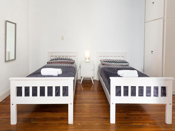 LOPEZ Hostel & Suites : photo 5 de la chambre chambre lits jumeaux avec salle de bains privative