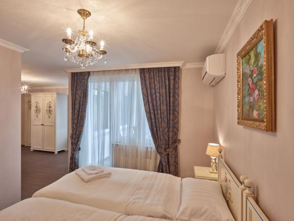 Apartment-Hotel am Rathaus : photo 3 de la chambre chambre triple avec balcon